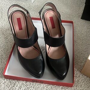 5/48 is a Saks brand. Beautiful high heels, worn once.